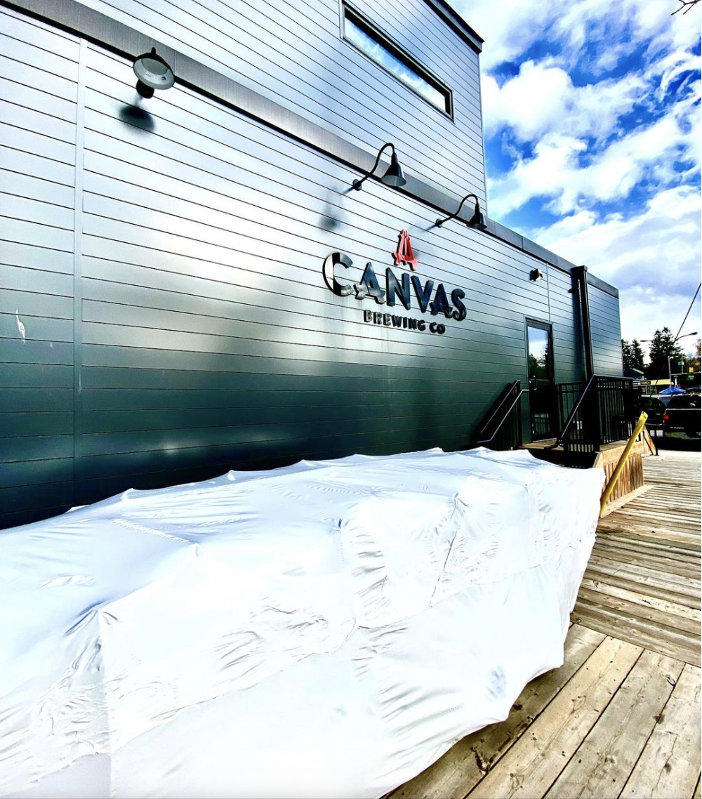 Outdoor furniture shrink wrapped on site at Canvas Brewing Co in Huntsville